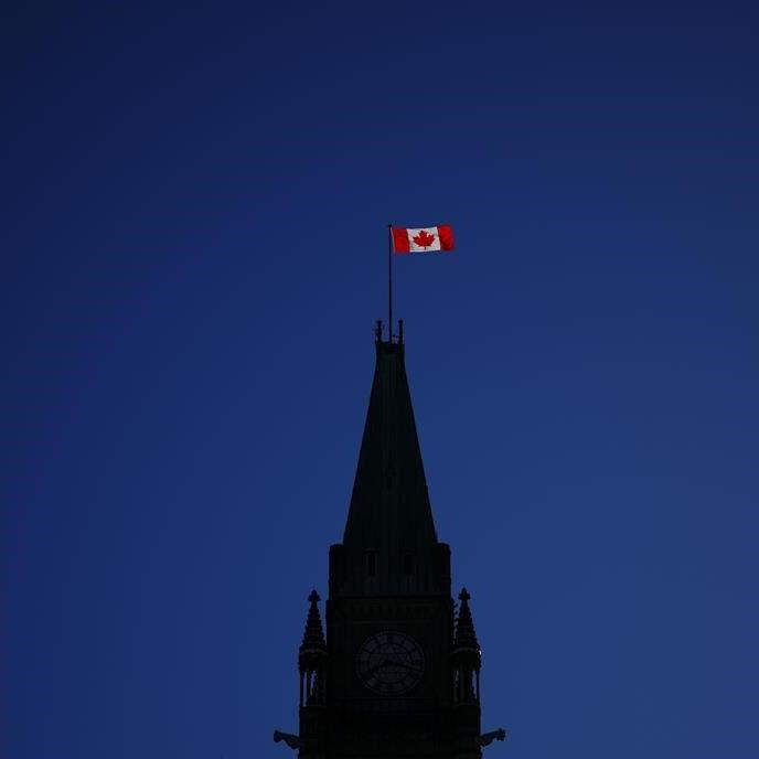 Different schools of thought on why Canada drapes itself with red and white